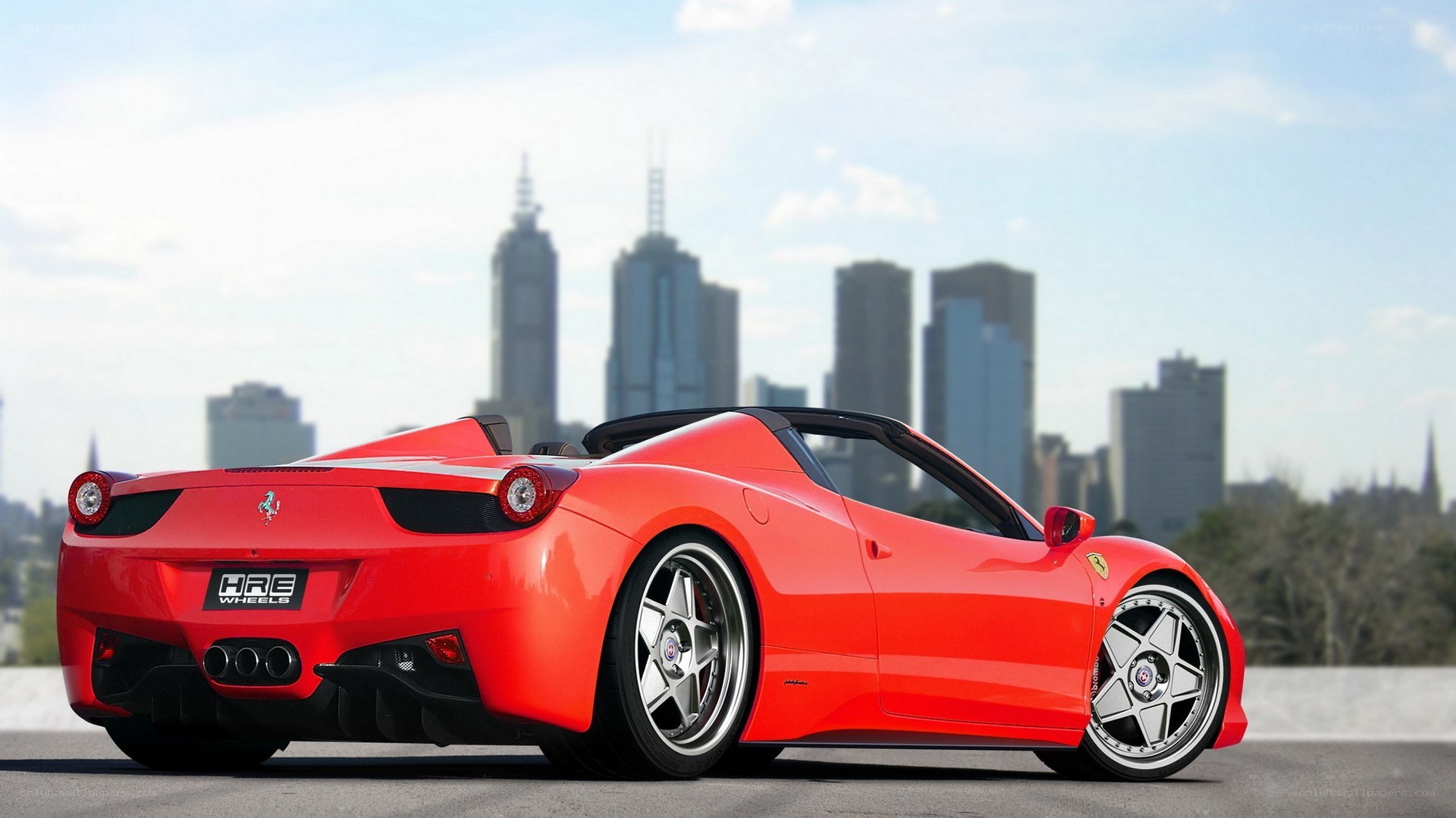Red Ferrari in city