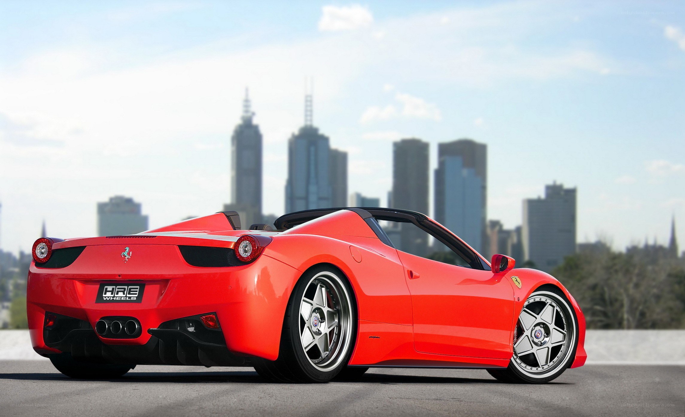 Red Ferrari in city