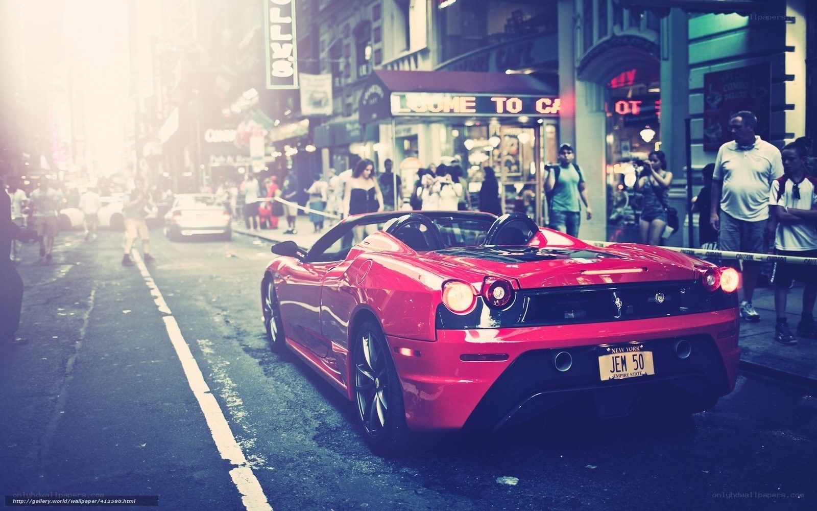 Red Ferrari in city street