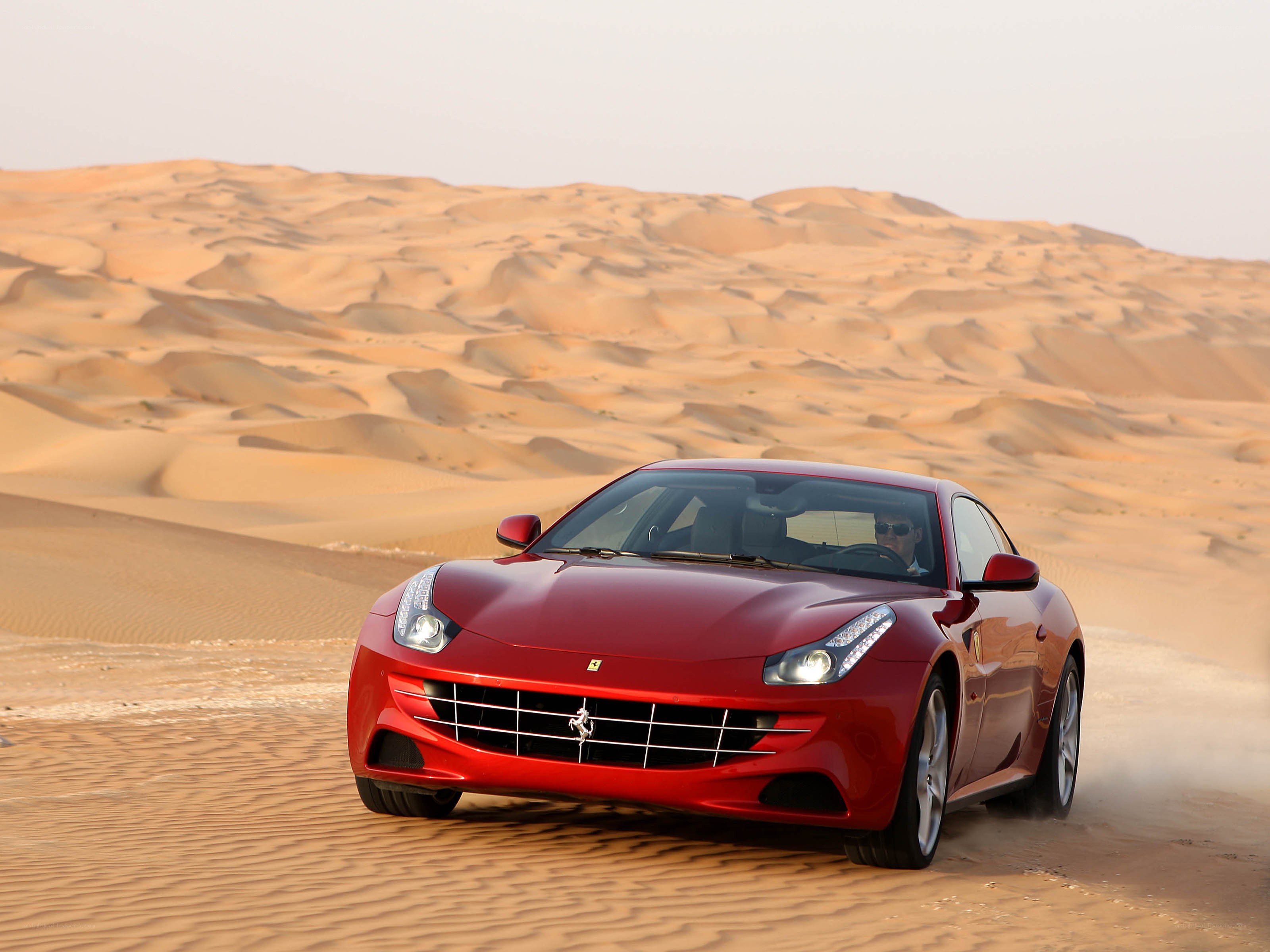 Red Ferrari in desert