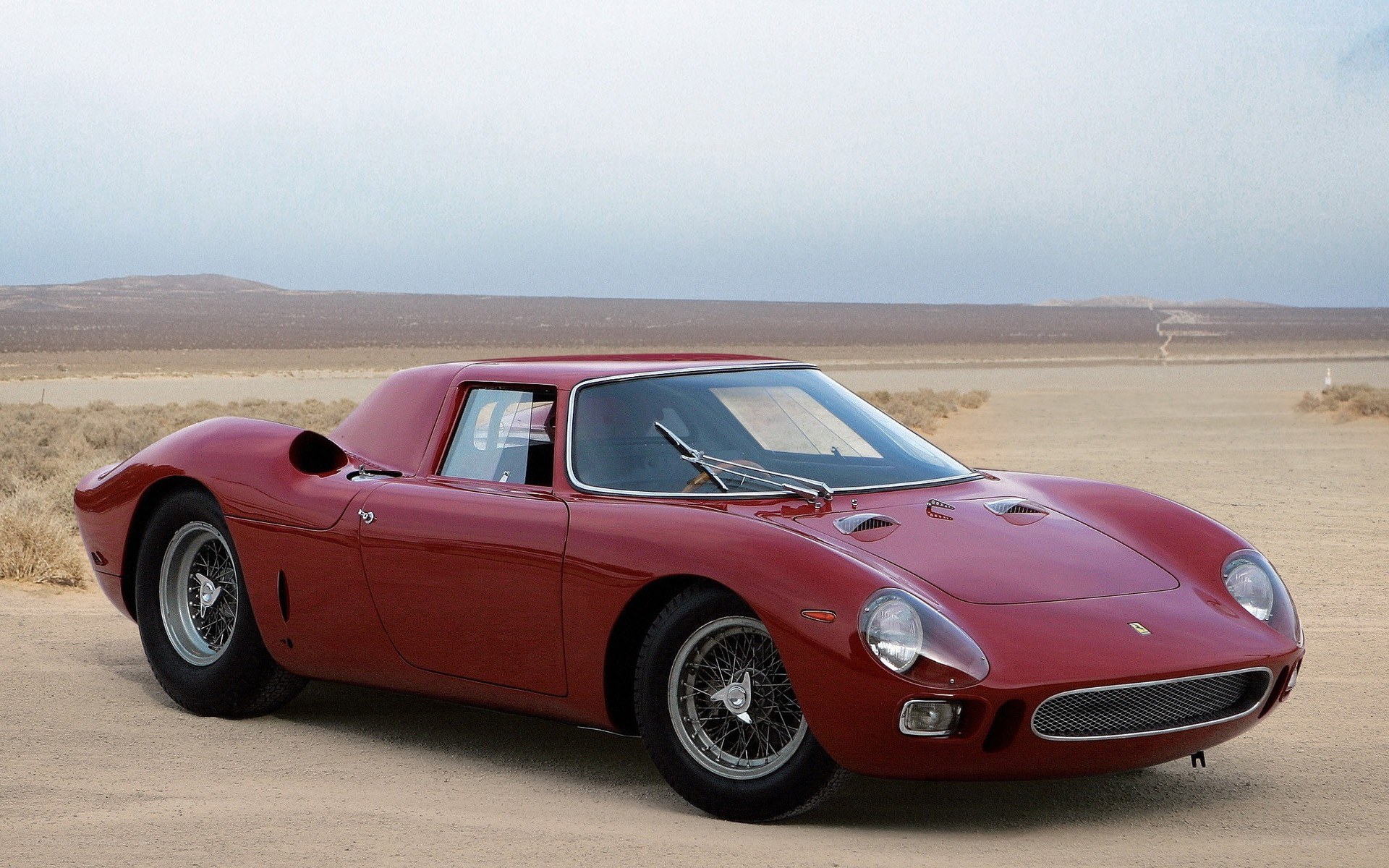 Red Ferrari in desert