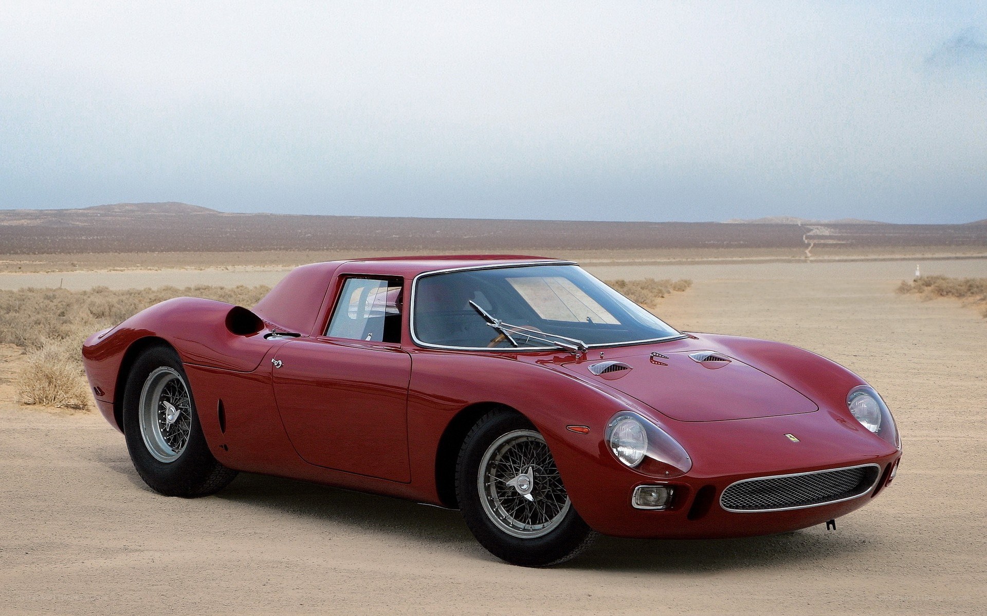 Red Ferrari in desert