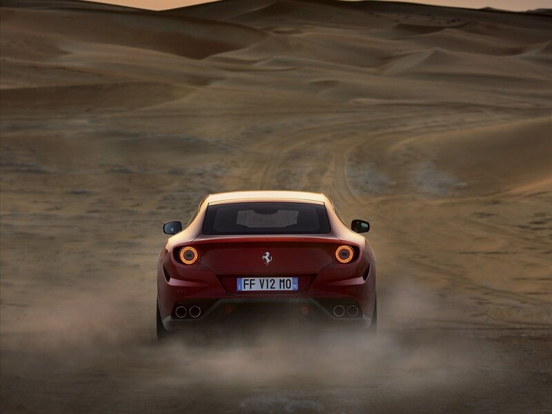 Red Ferrari in Desert — Dramatic, Sunset