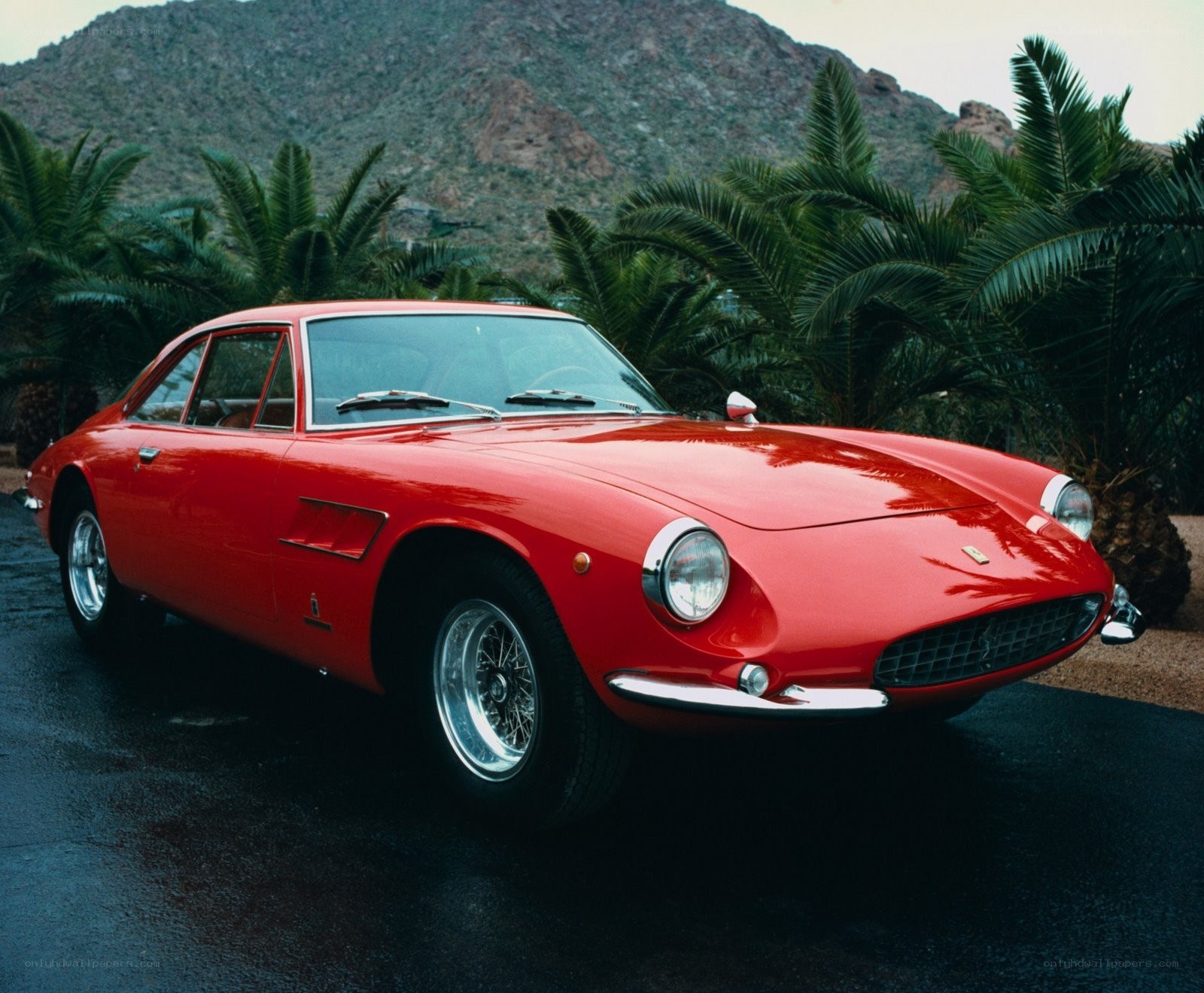 Red Ferrari in desert setting