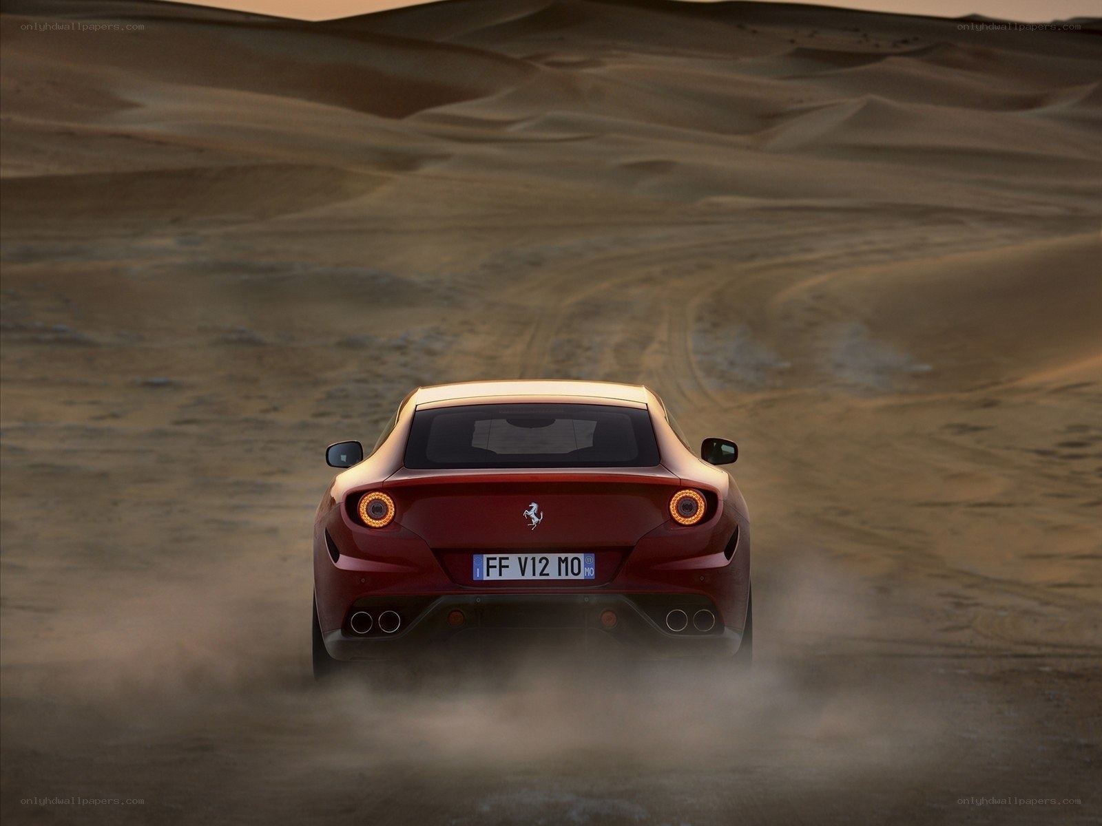 Red Ferrari in desert