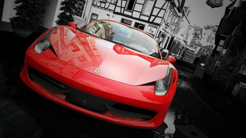 Red Ferrari in European town