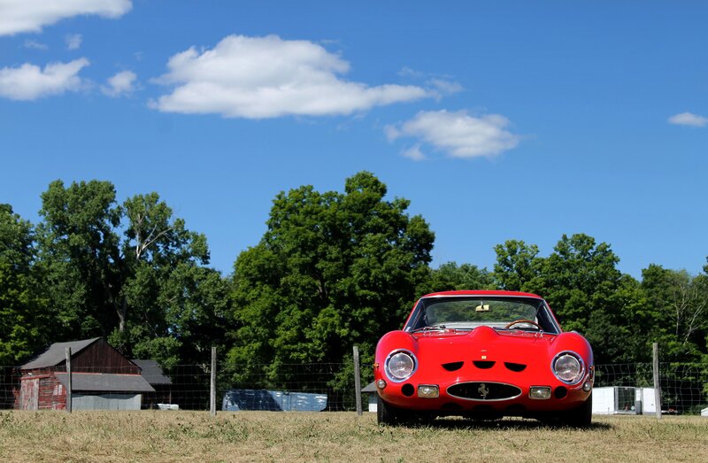 Red Ferrari in Field