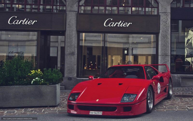 Red Ferrari in front of Cartier
