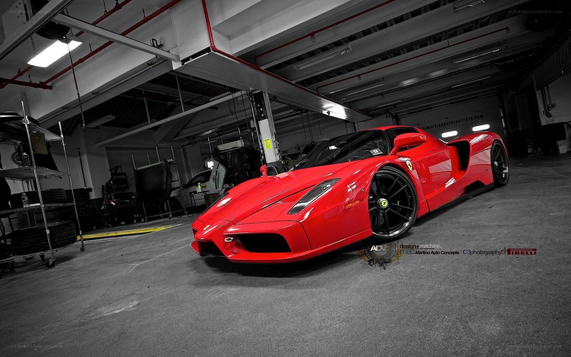red ferrari in garage