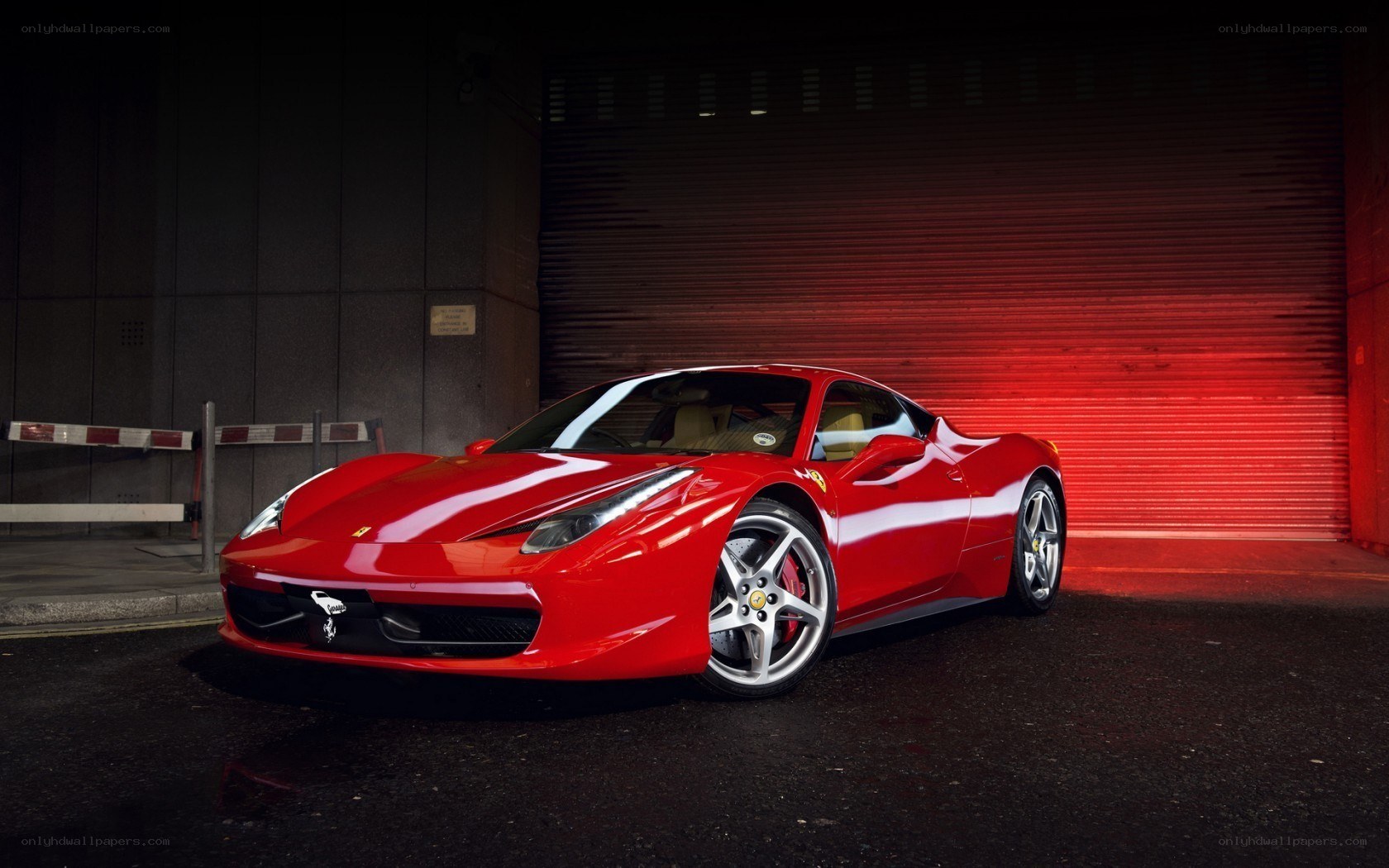 Red Ferrari in garage
