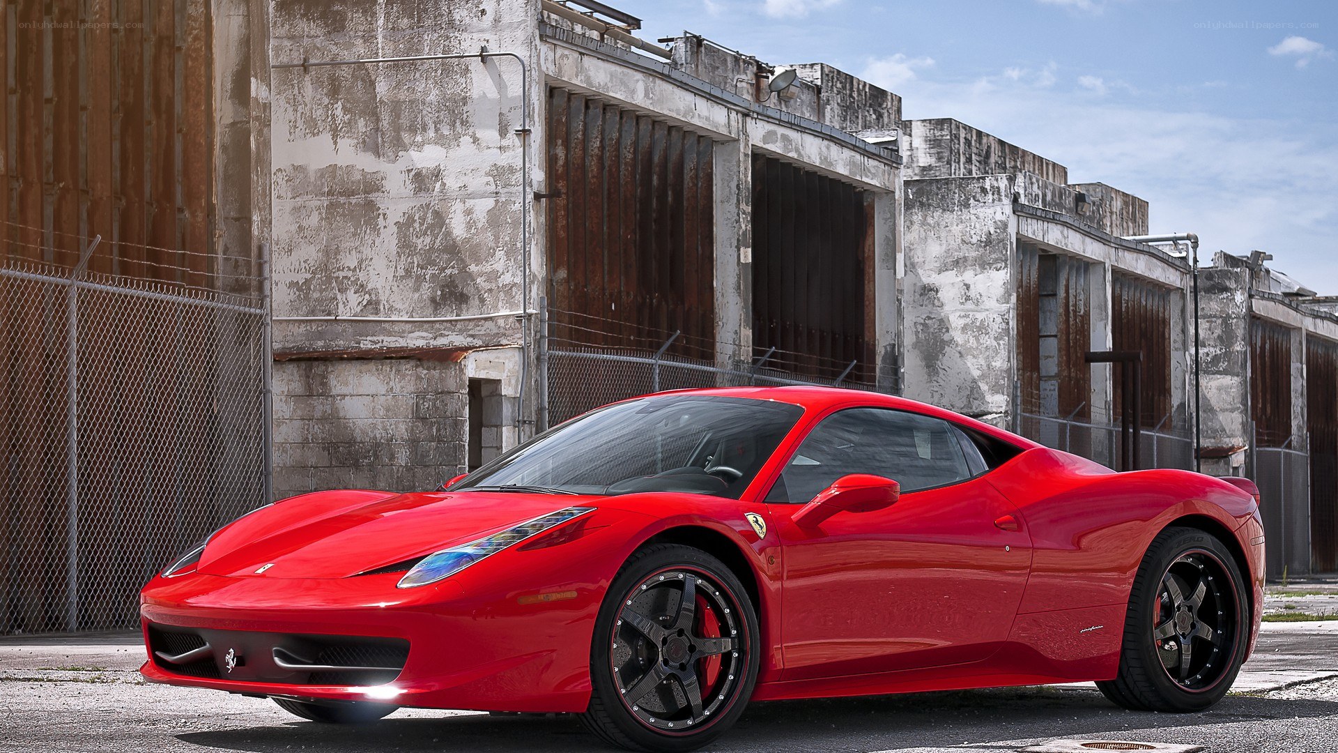 Red Ferrari in industrial setting