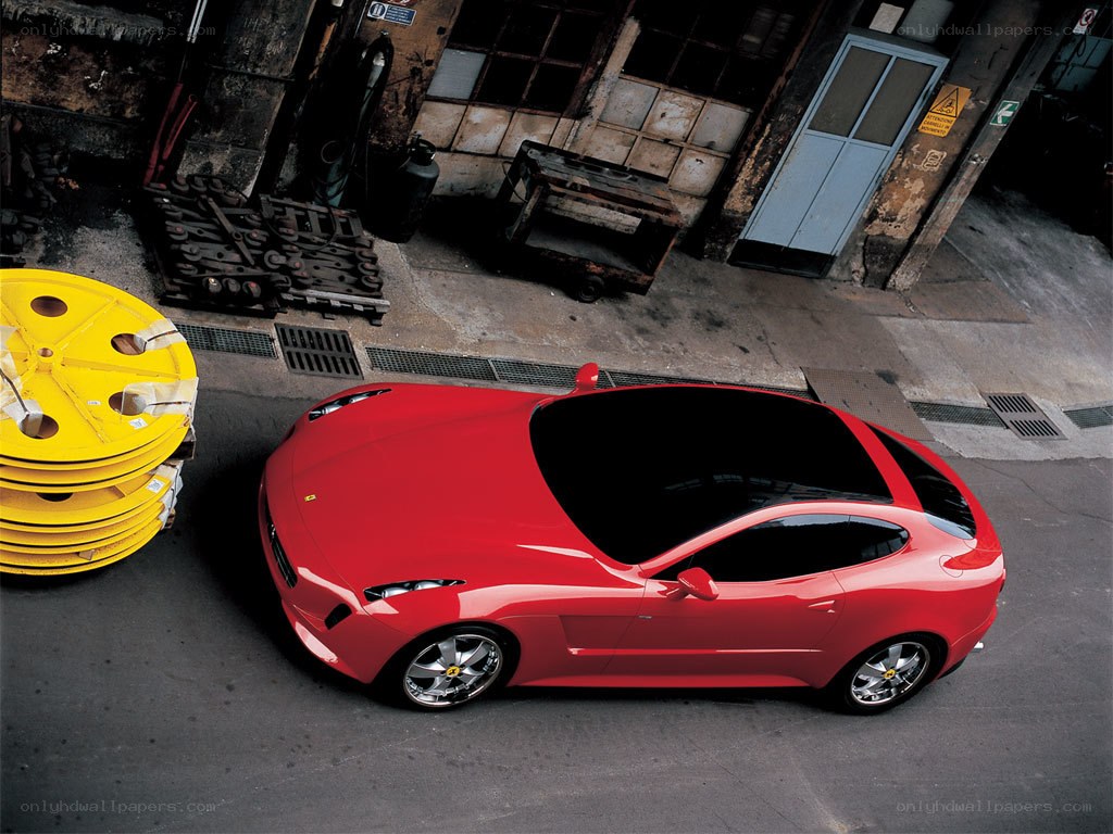 Red Ferrari in industrial setting