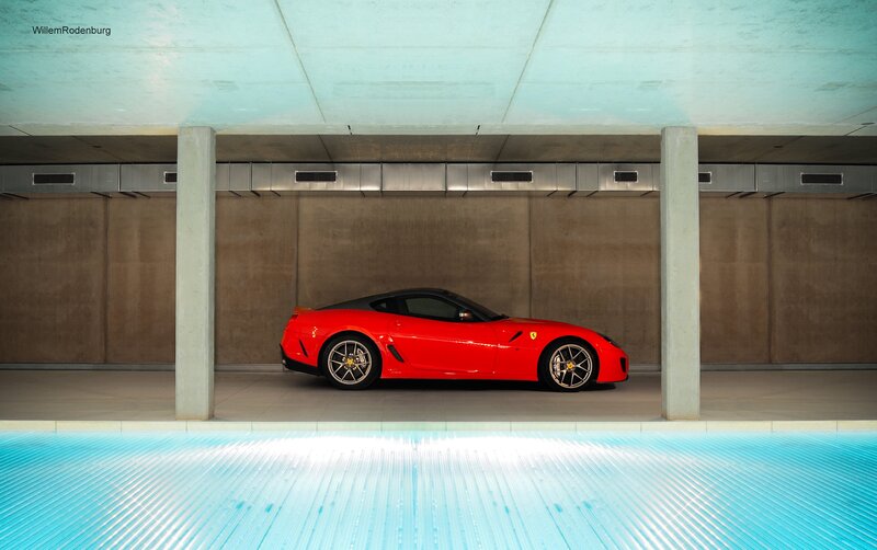 Red Ferrari in modern garage