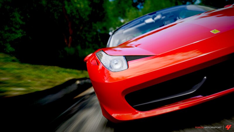 red ferrari in motion