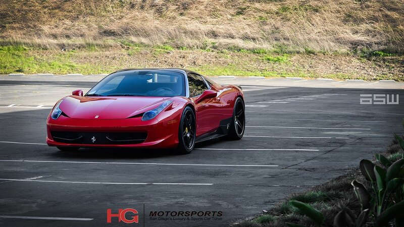 Red Ferrari in parking lot