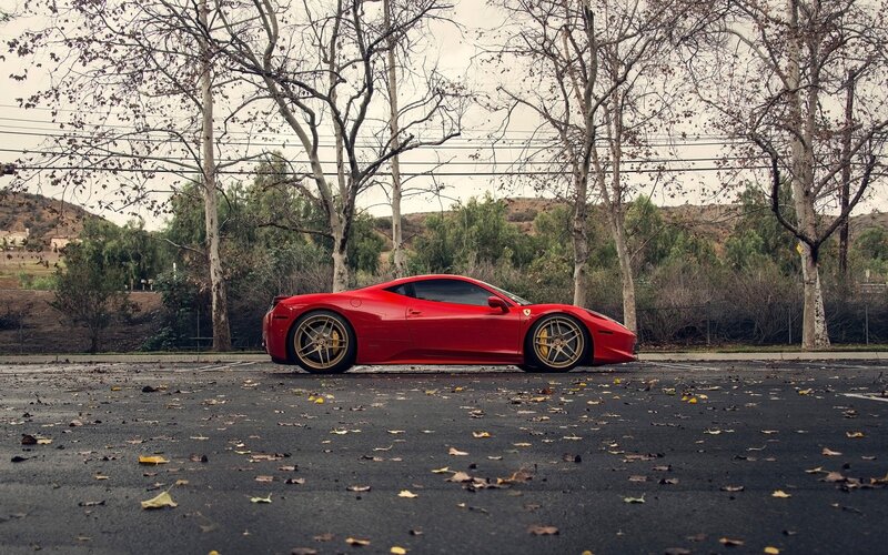 Red Ferrari in Parking Lot — Calm