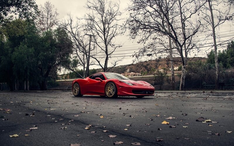 Red Ferrari in Parking Lot — Dramatic
