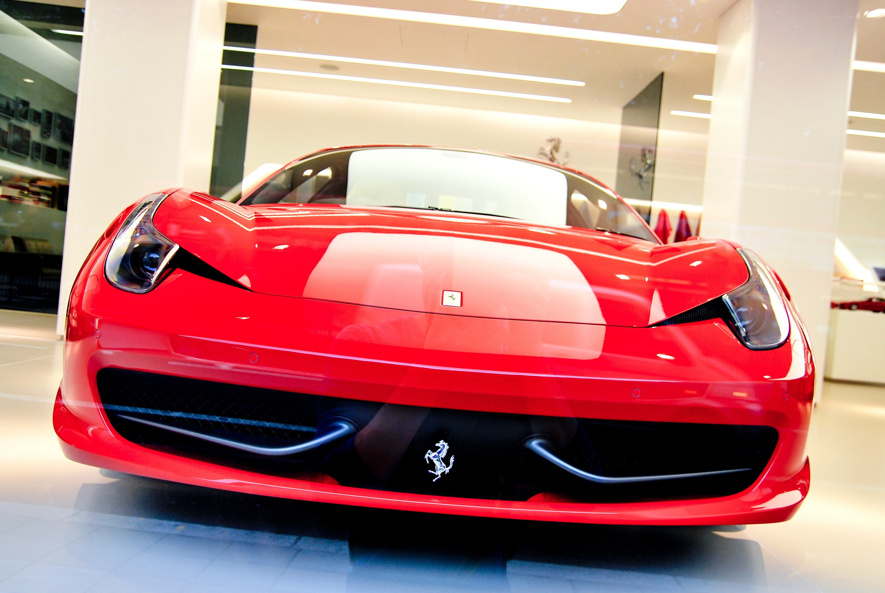 Red Ferrari in showroom
