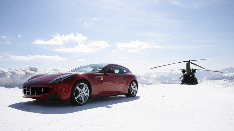 Red Ferrari in snowy landscape