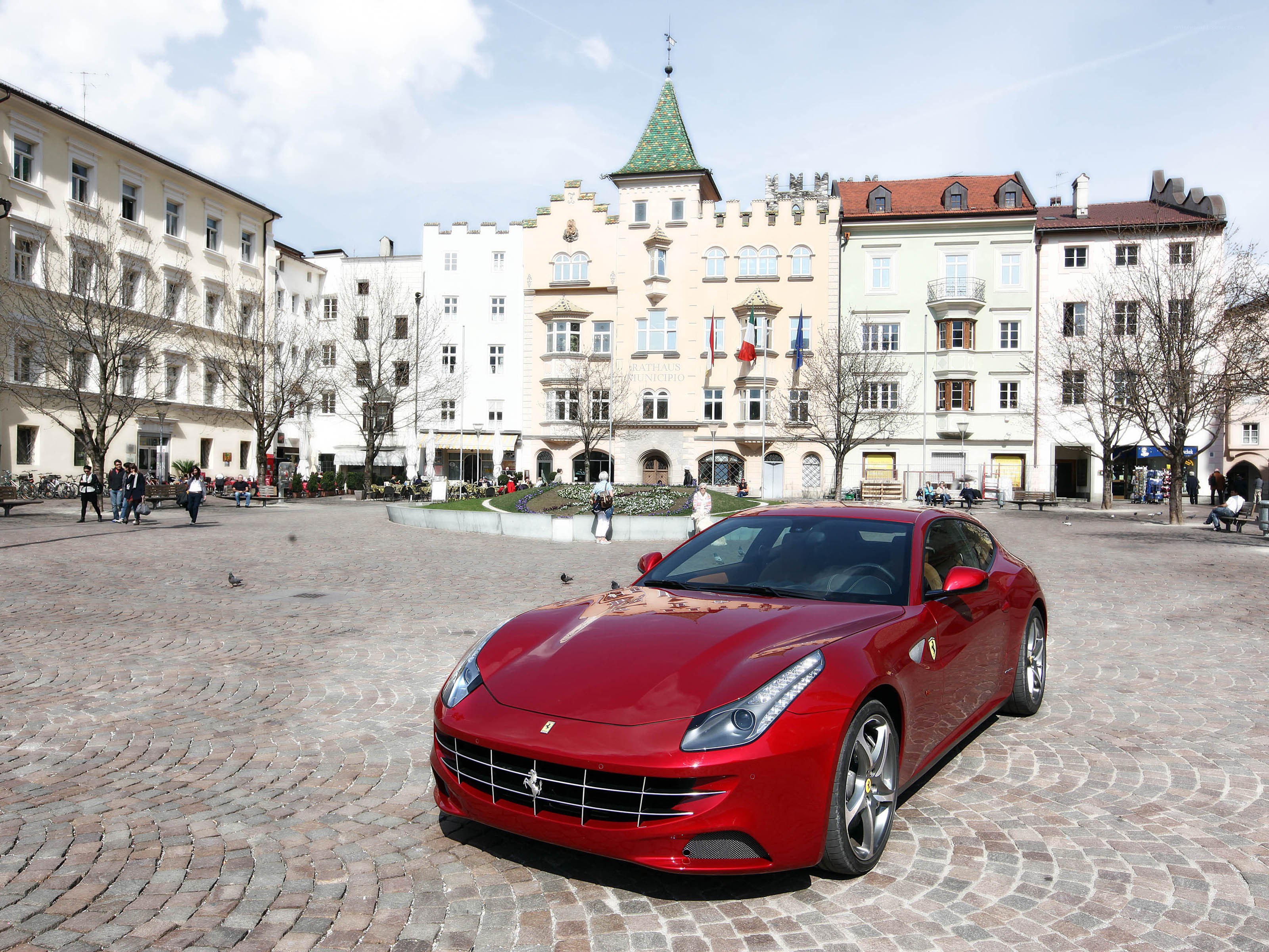 Red Ferrari in town square