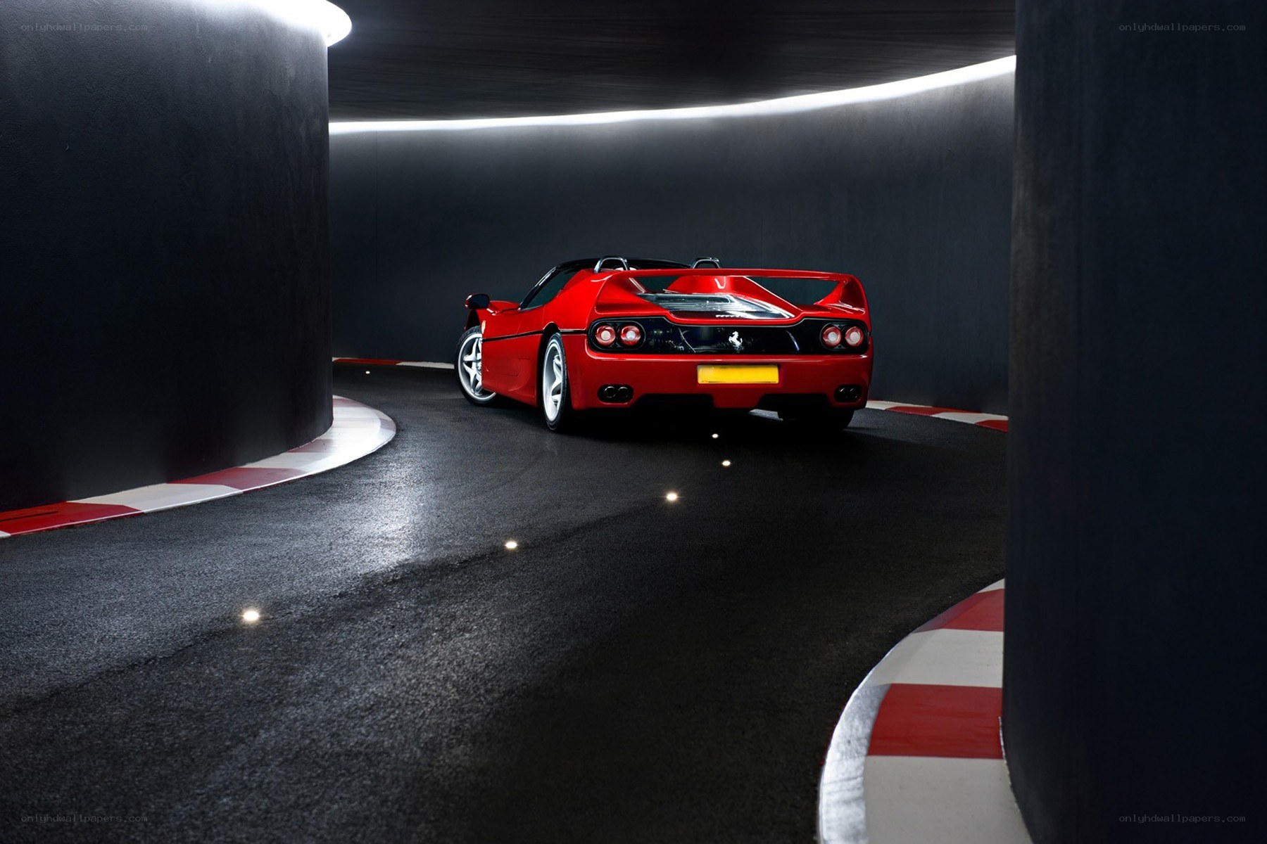 Red Ferrari in tunnel