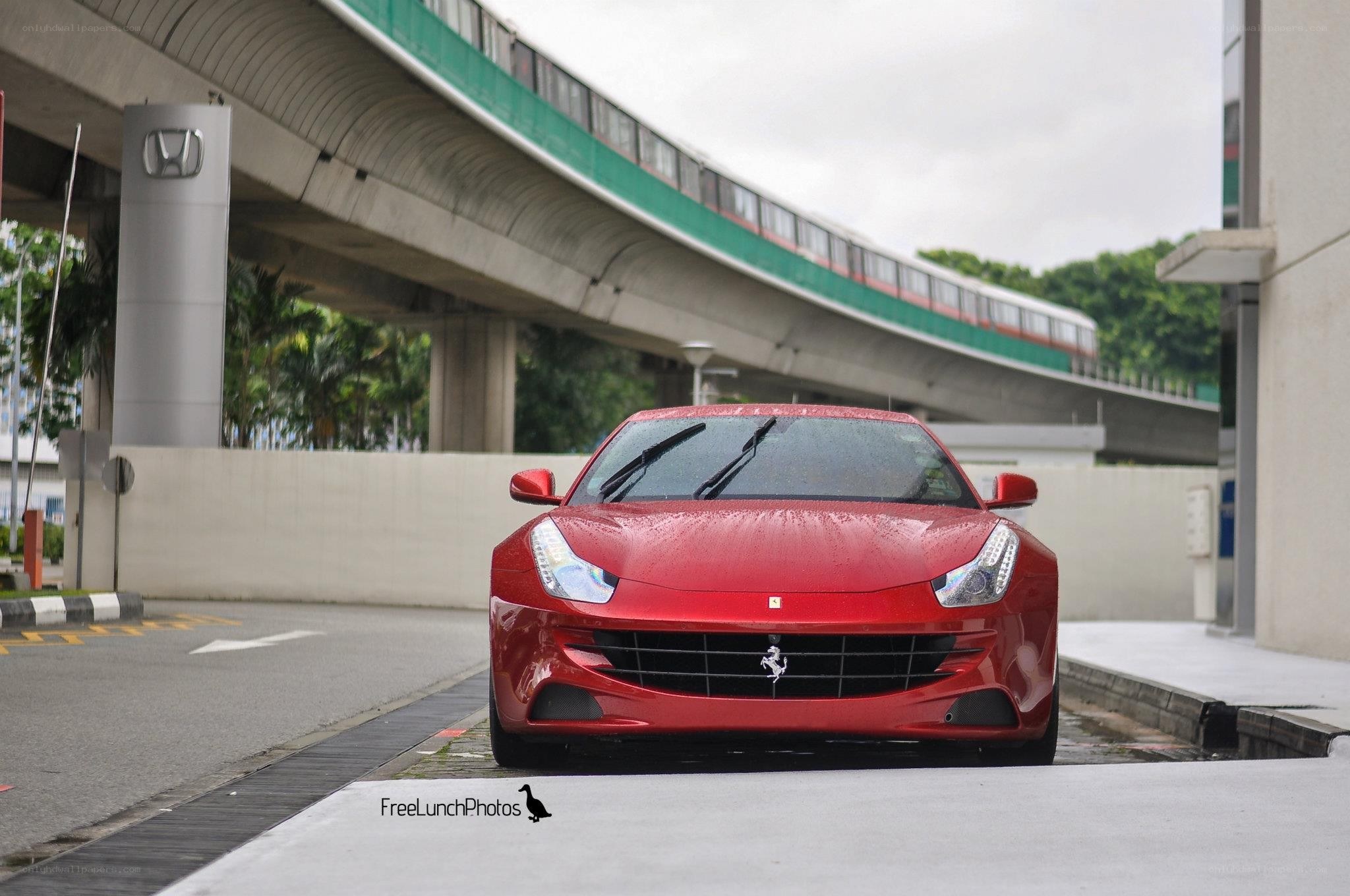 Red Ferrari in urban setting