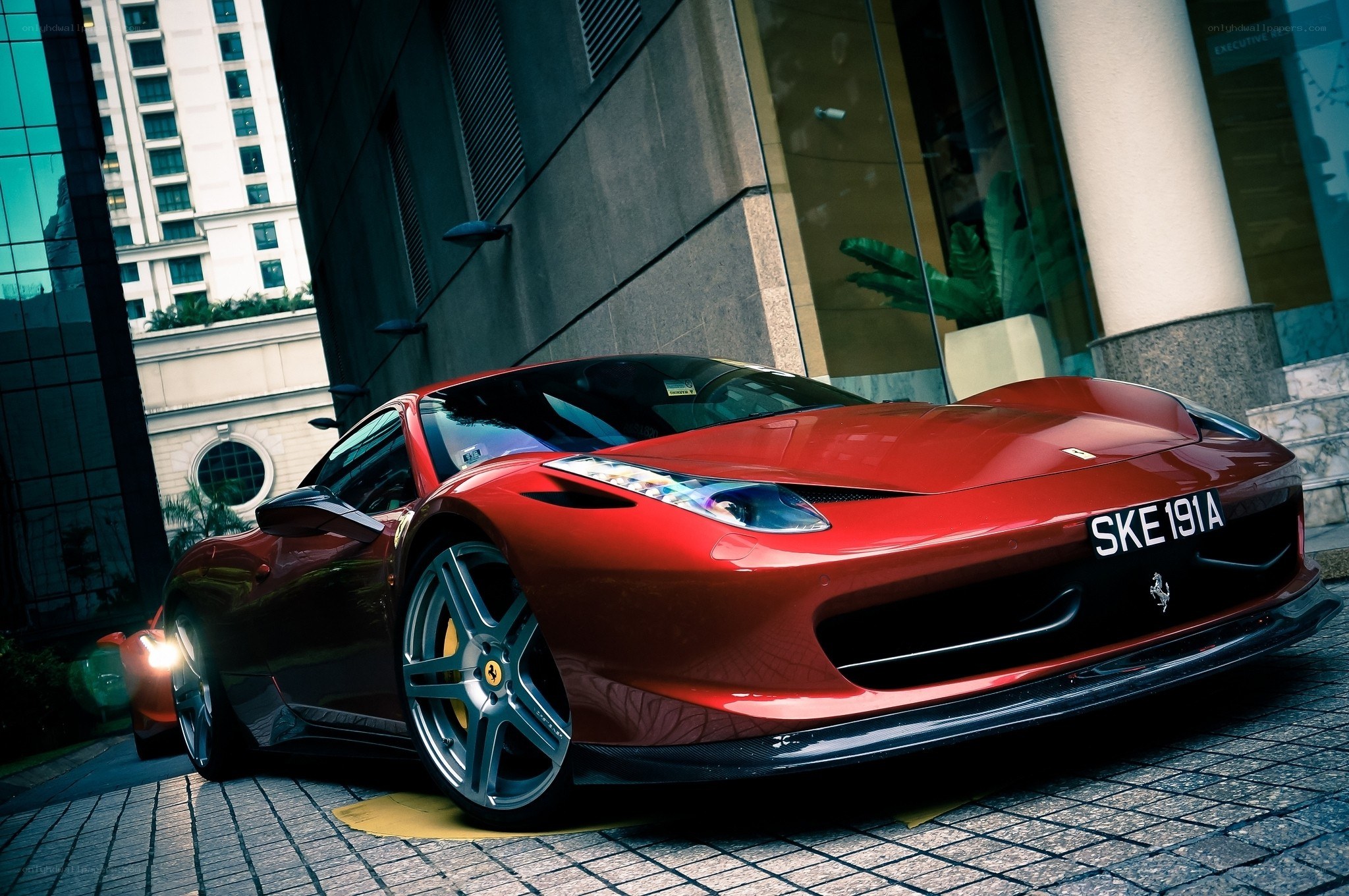 Red Ferrari in urban setting