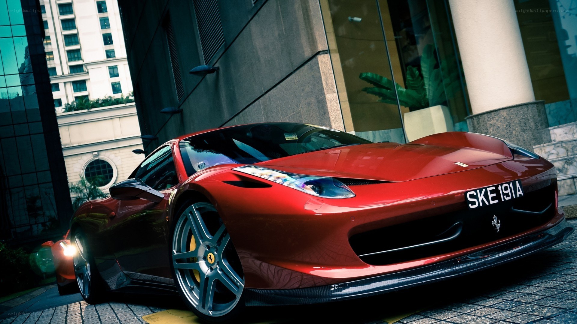 Red Ferrari in urban setting
