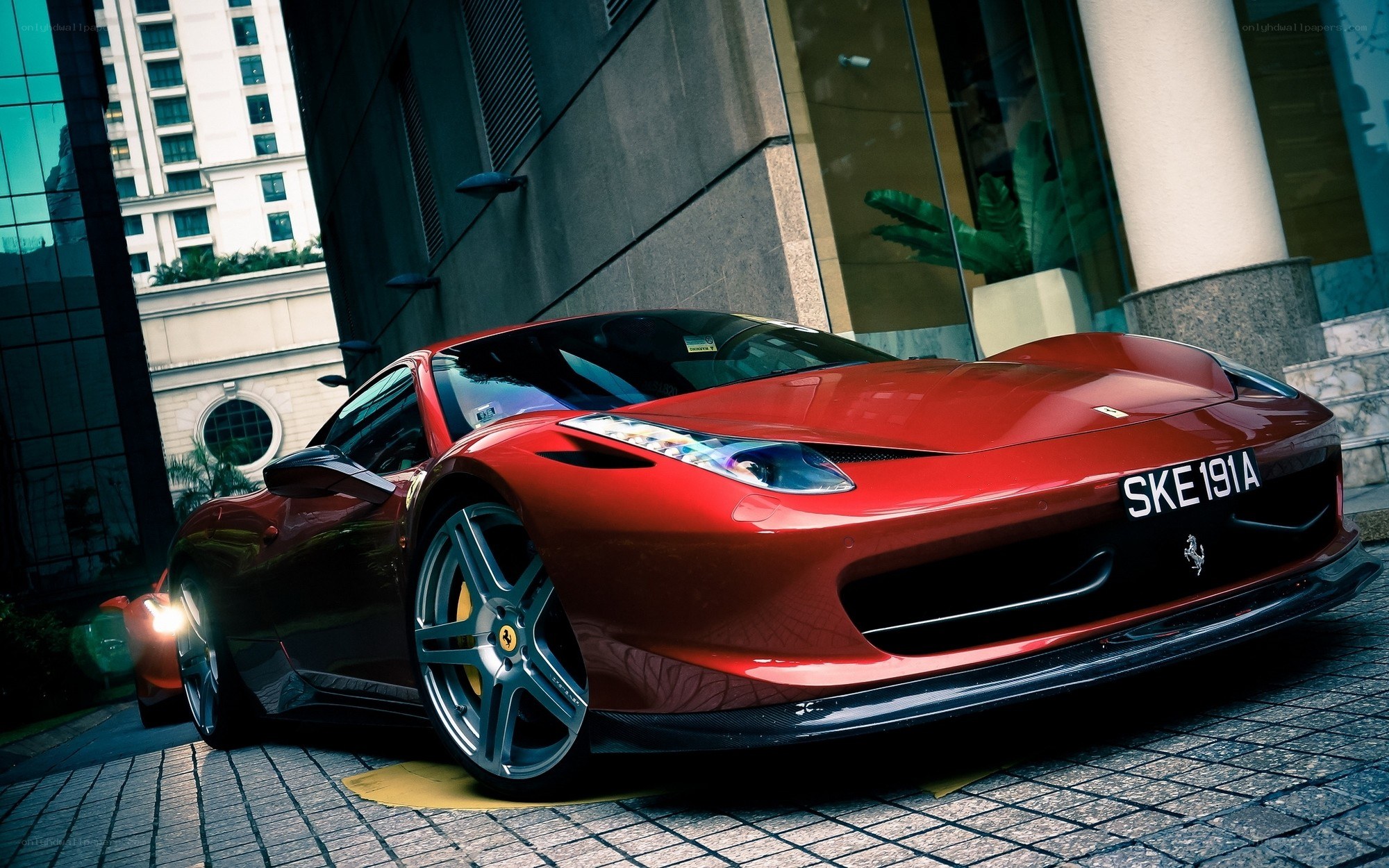 Red Ferrari in urban setting