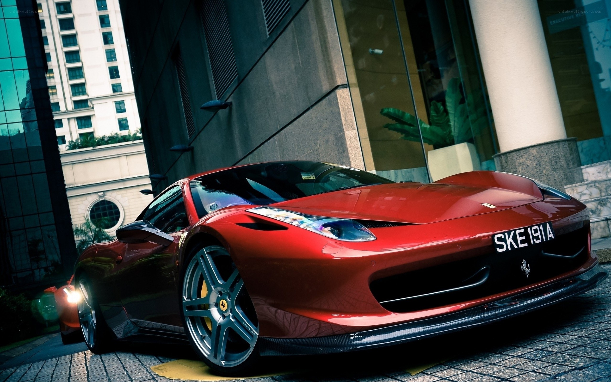 Red Ferrari in urban setting