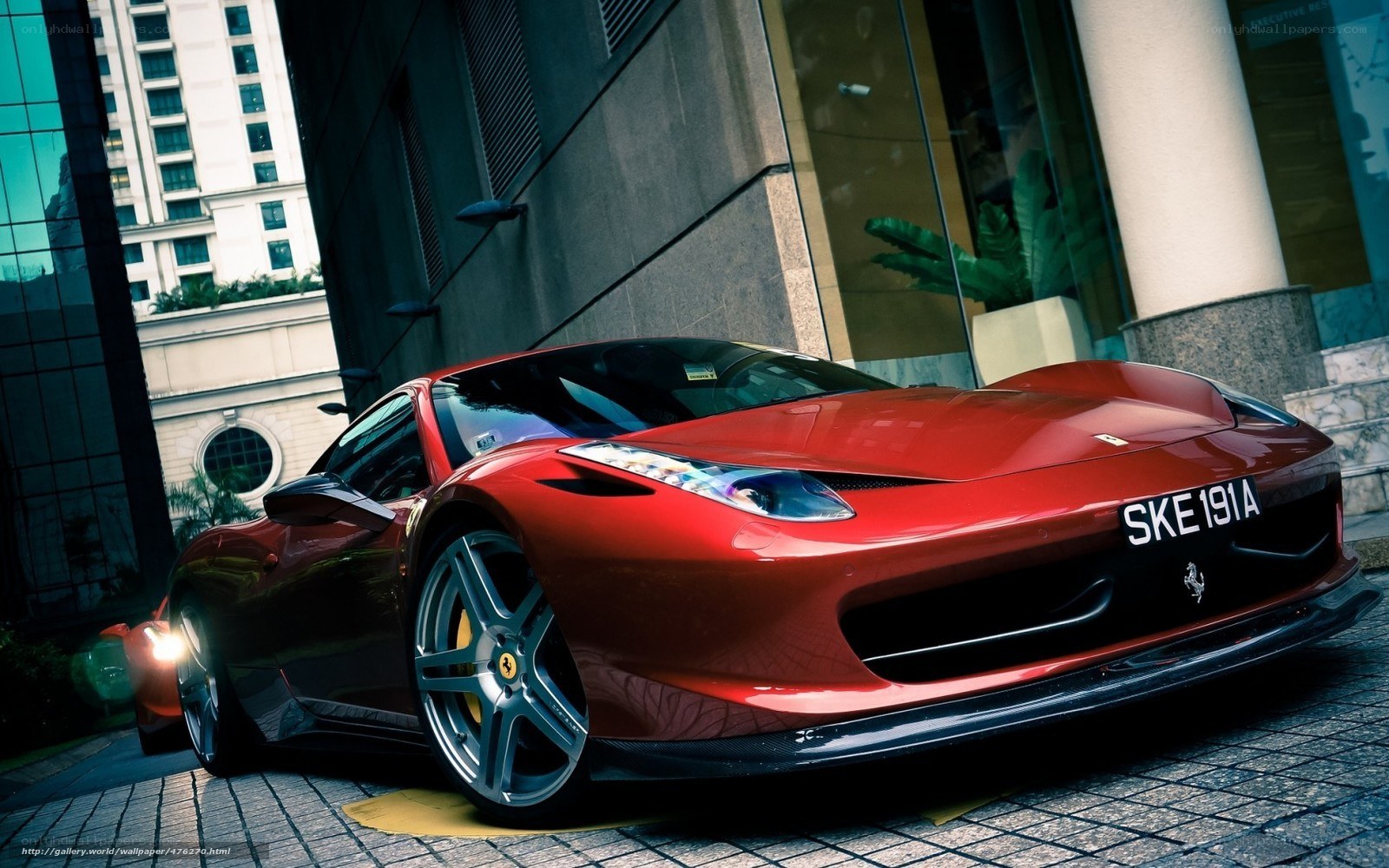 Red Ferrari in urban setting