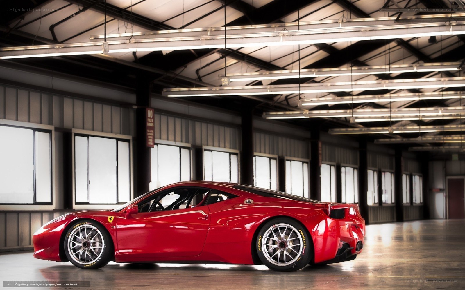 Red Ferrari in warehouse