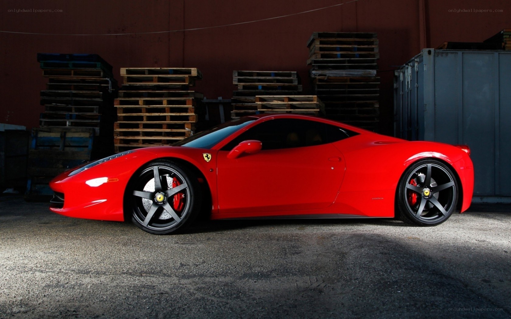 Red Ferrari in warehouse