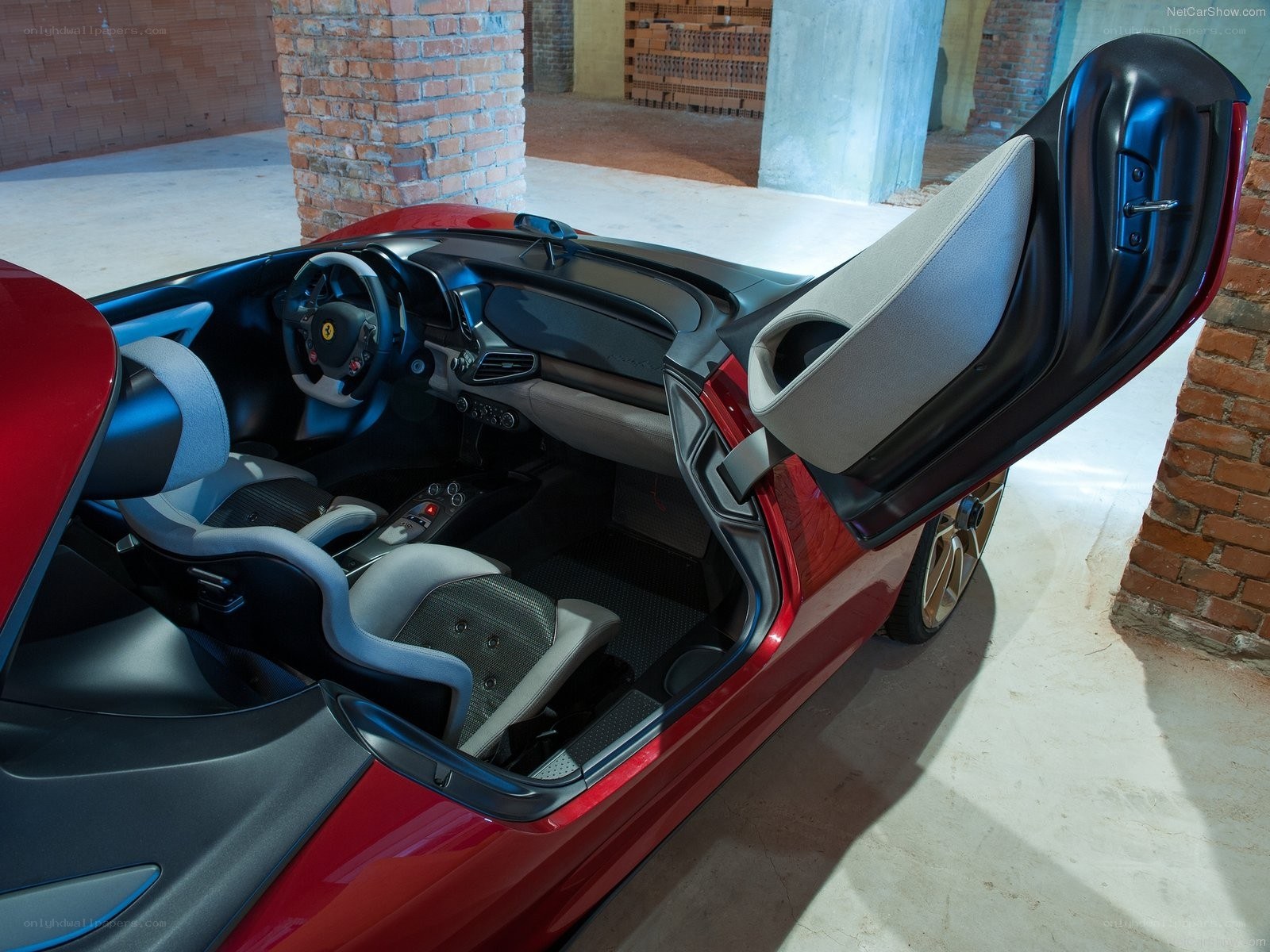 Red Ferrari interior with open door