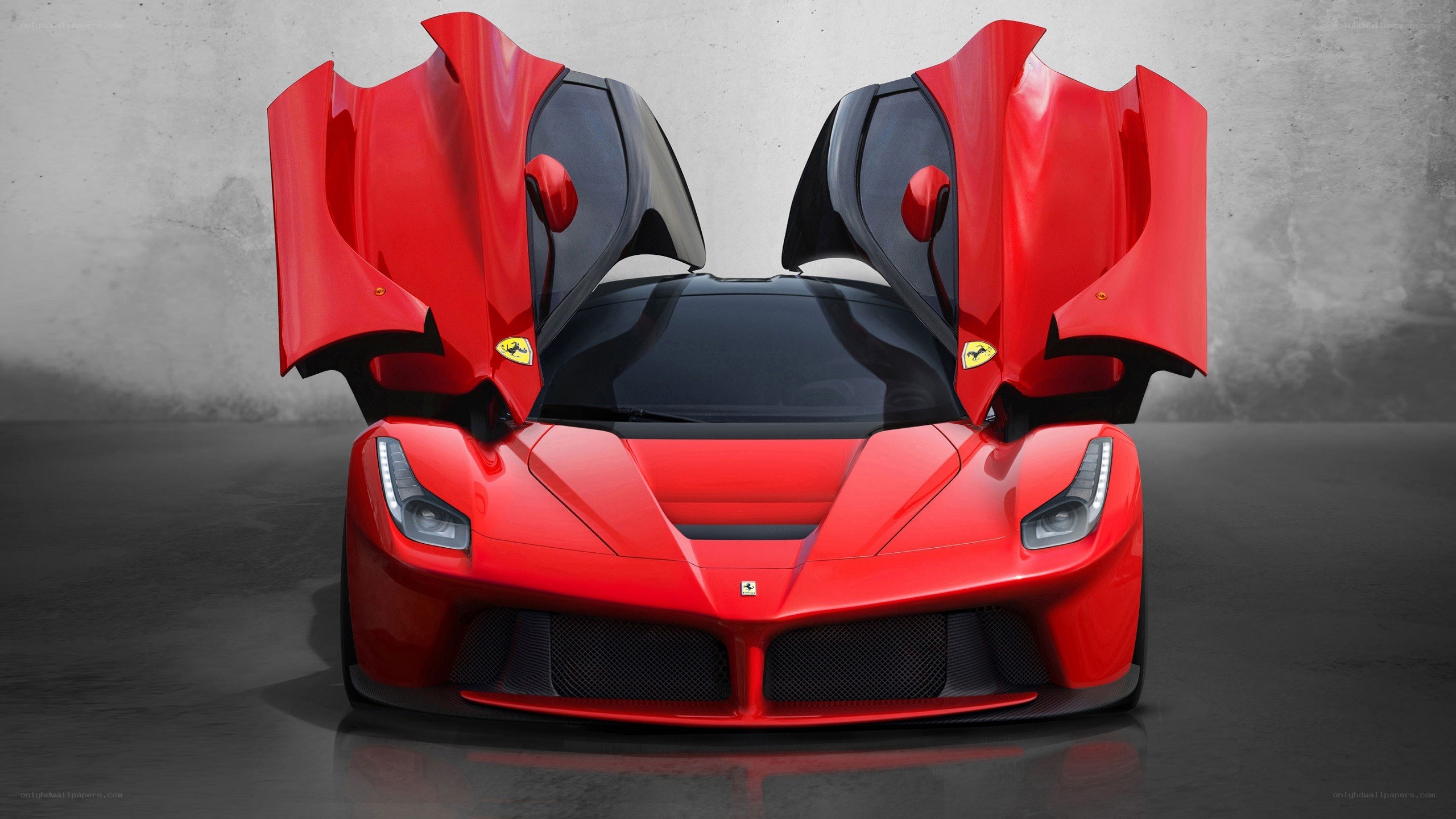 Red Ferrari LaFerrari with doors open