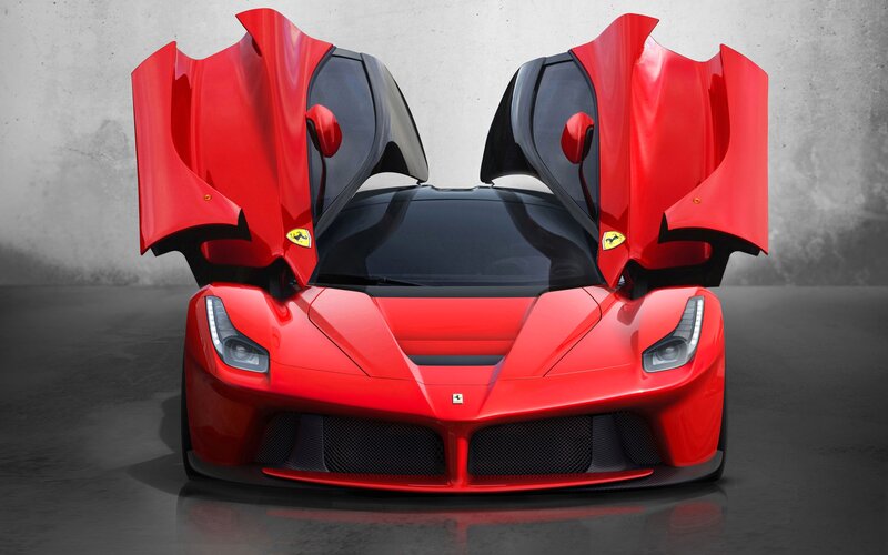 Red Ferrari LaFerrari with doors open