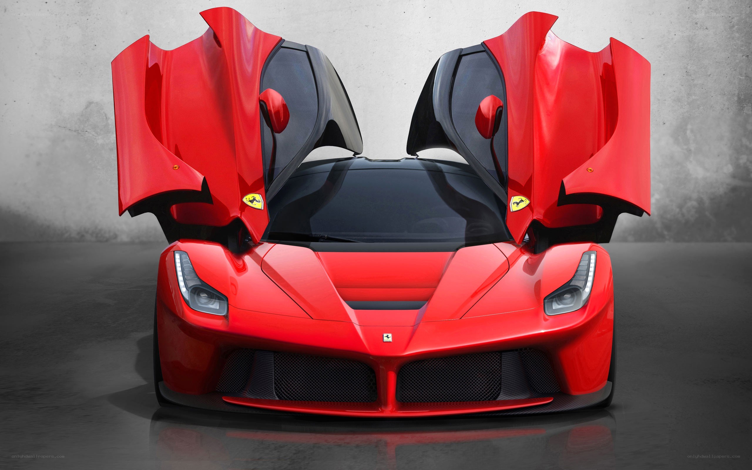 Red Ferrari LaFerrari with doors open