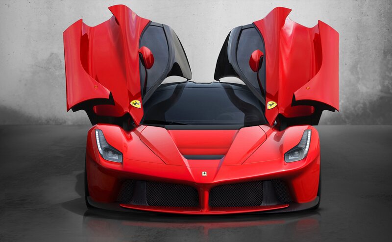 Red Ferrari LaFerrari with doors open