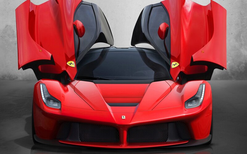Red Ferrari LaFerrari with doors open