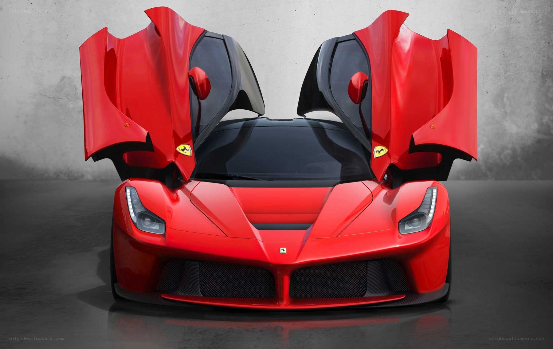 Red Ferrari LaFerrari with doors open
