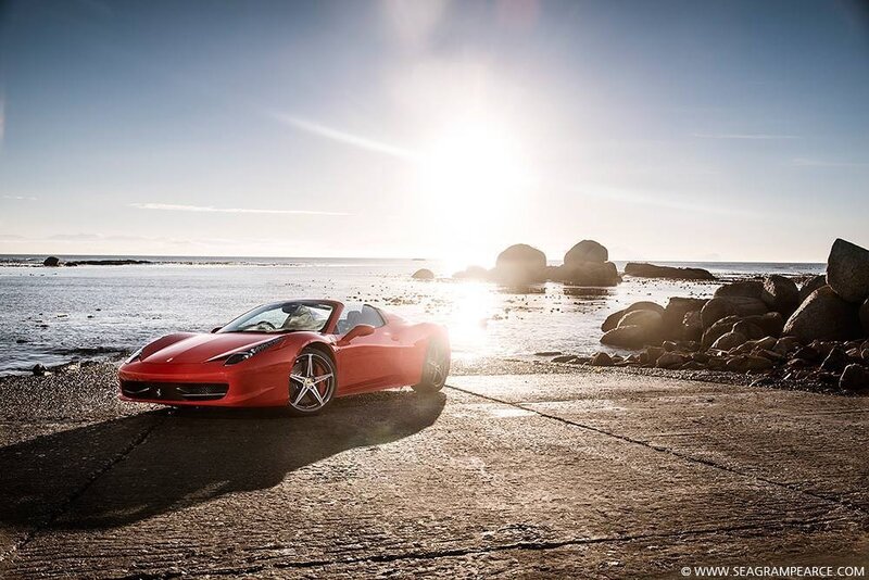 Red Ferrari on a beach