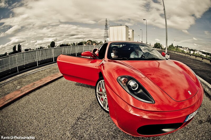 Red Ferrari on a bridge