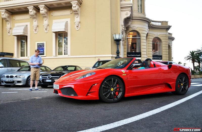 Red Ferrari on a city street