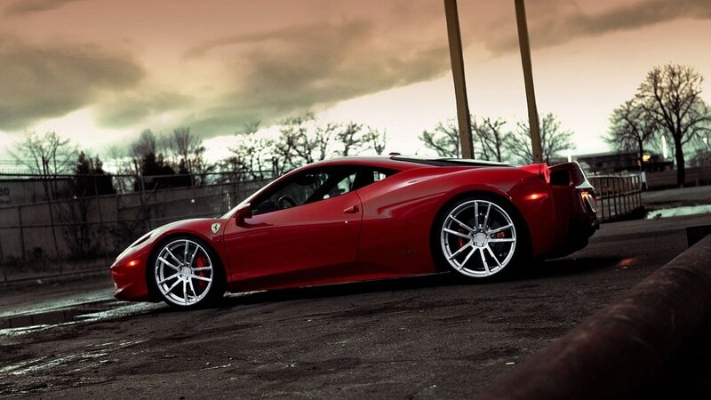 Red Ferrari on a city street