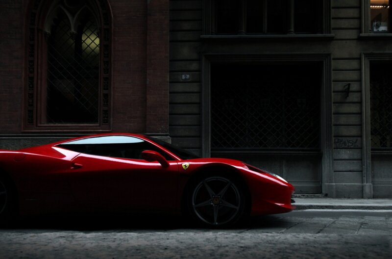 Red Ferrari on a city street