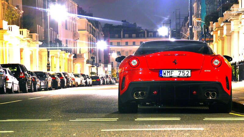 Red Ferrari on a city street