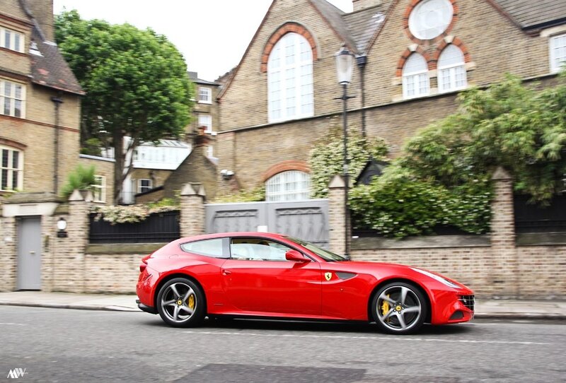 Red Ferrari on a city street