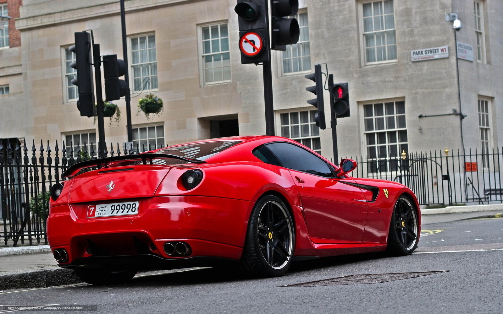 Red Ferrari on a city street