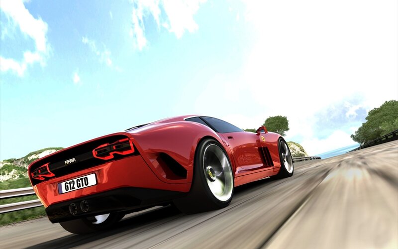 Red Ferrari on a coastal road
