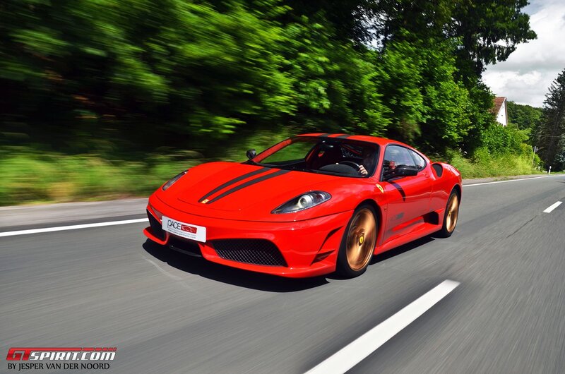 Red Ferrari on a country road